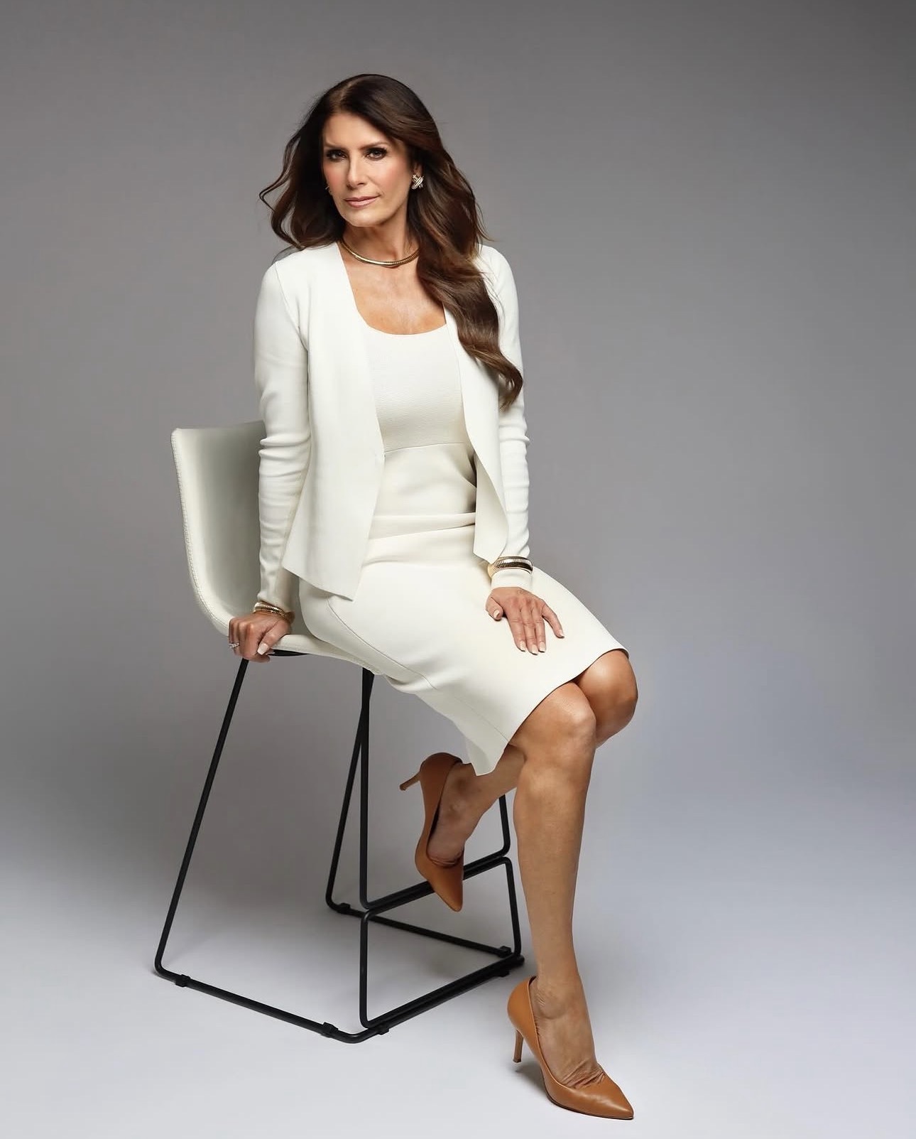 Cream tailoring on a soft grey seamless